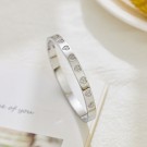 Goldstory - LOVE Bling Armring i stål thumbnail